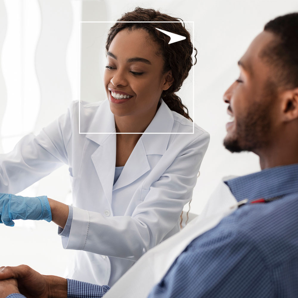 Doctor showing patient xrays on tablet