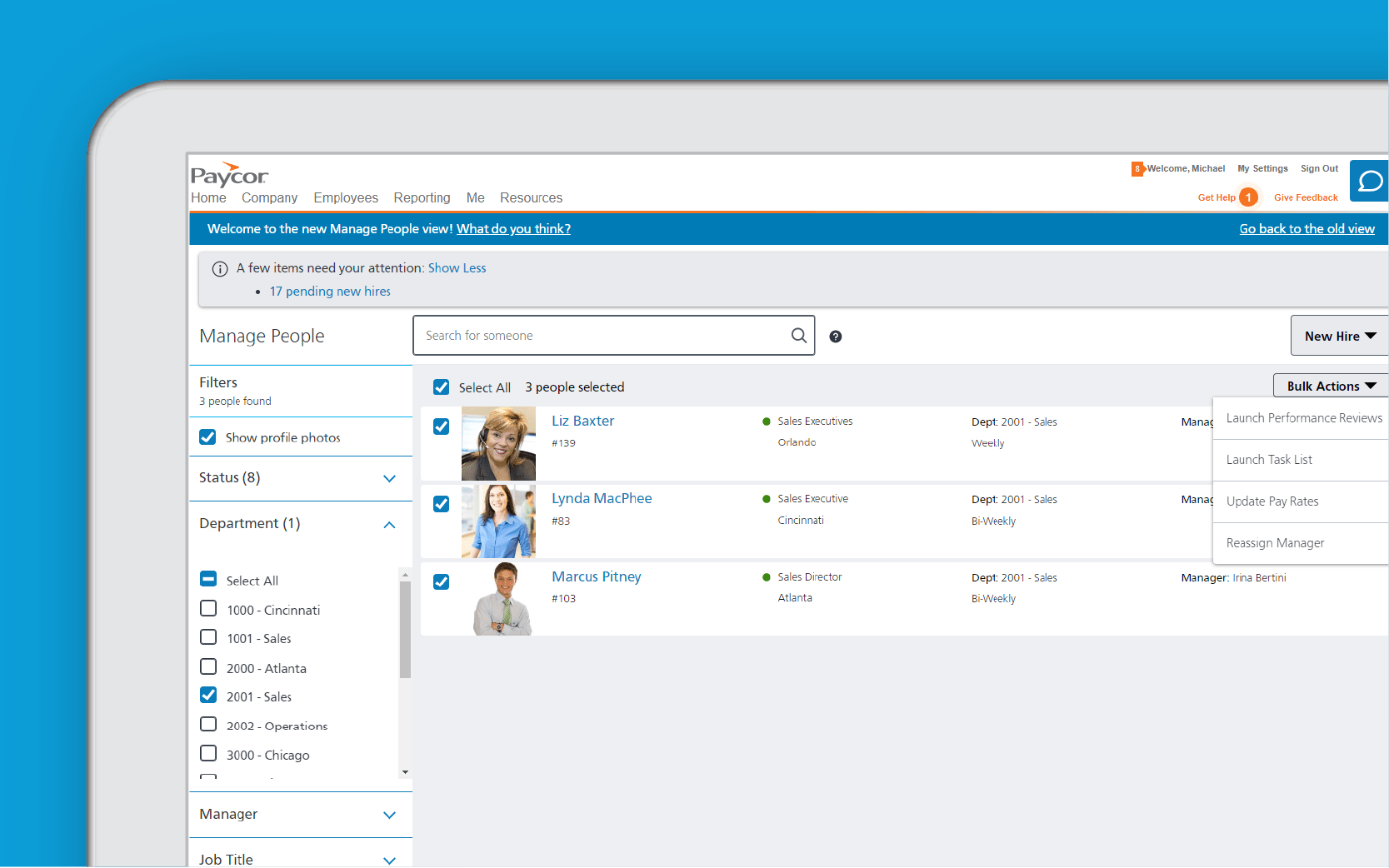 Corner of tablet showing Paycor compensation dashboard against blue background