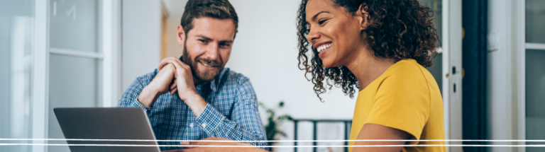 man-and-woman-reviewing-laptop-screen