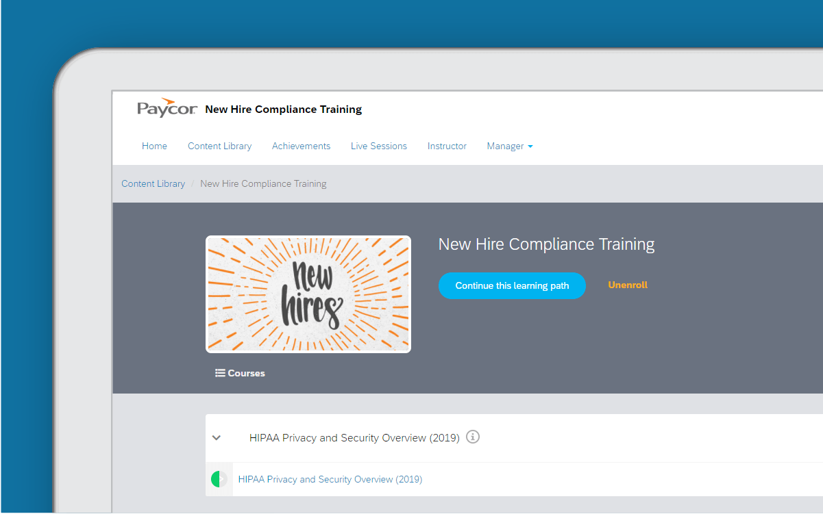 Corner of tablet showing new hire compliance training against blue background