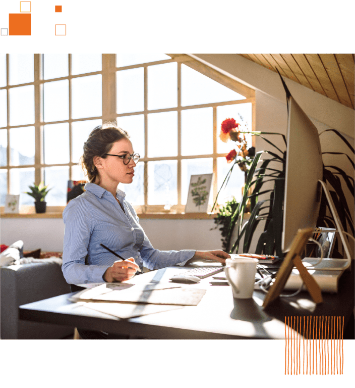 Woman working on computer at home