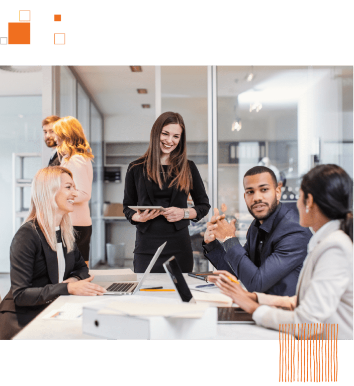 Group of coworkers talking at conference table