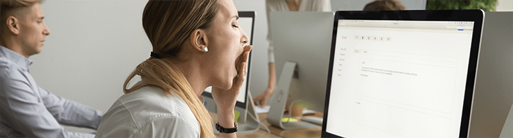 woman yawning bored at work