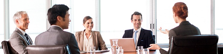 executives in meeting at conference table