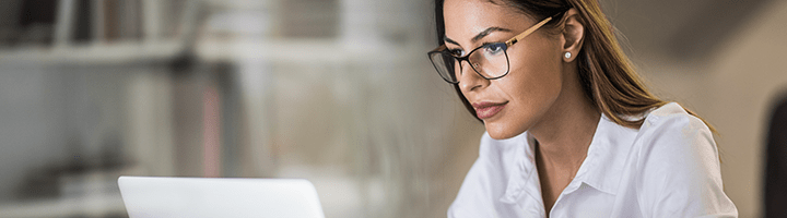 stressed woman working on computer