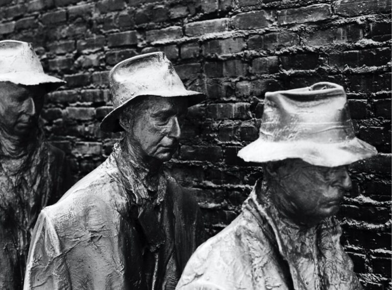 Men standing in line with black and white effect