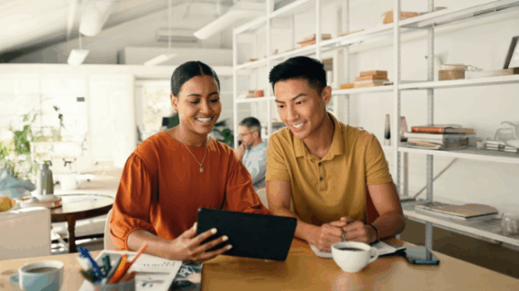 HR professionals discussing their talent development strategy and process