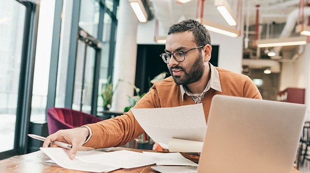 talent recruiter reviewing resumes