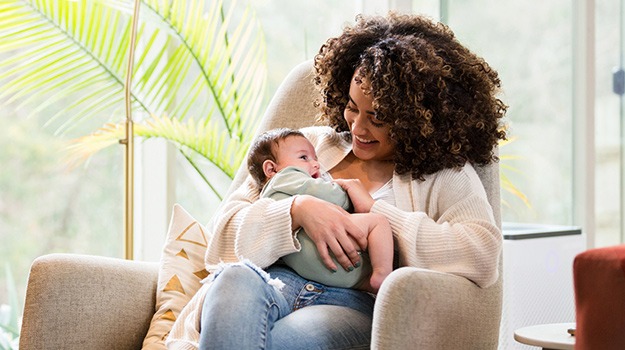 woman with baby on maternity leave