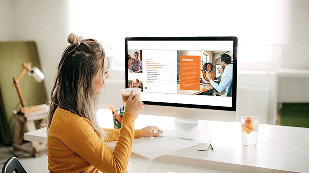 woman looking at computer screen showing an index