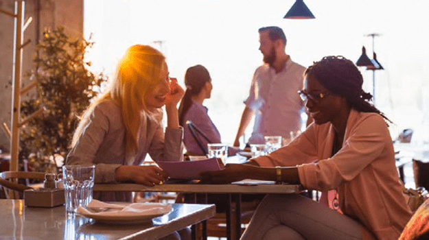 two people in a restaurant