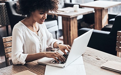 person running payroll from laptop