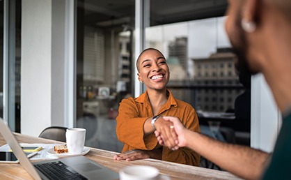 women shaking hands