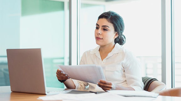 office worker filling paperwork