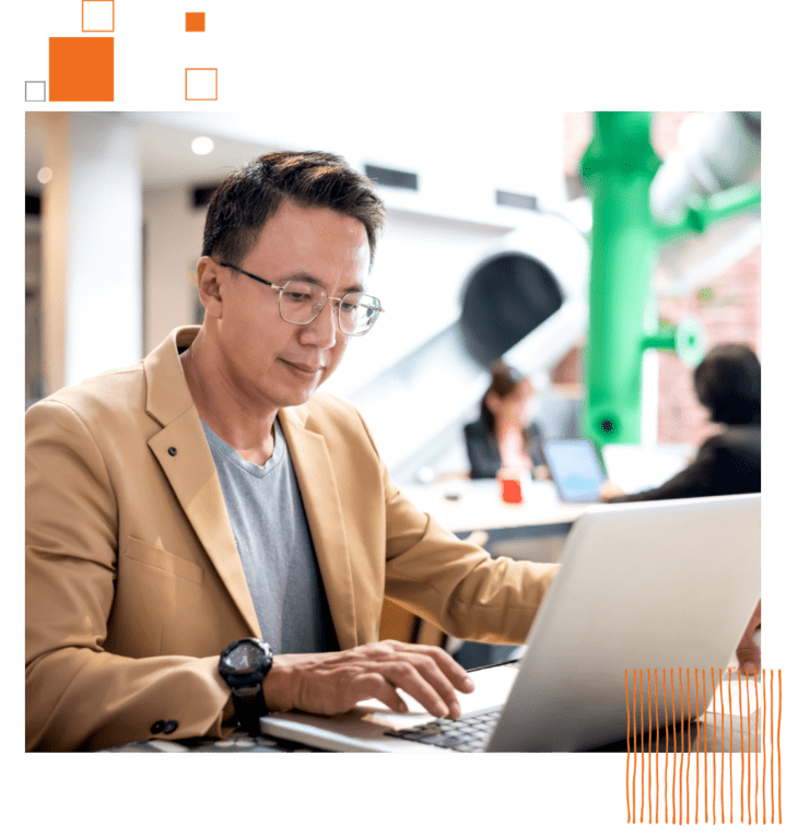 man in glasses and a laptop