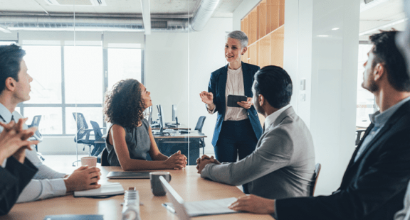 workers in conference room meeting