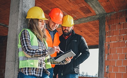 three construction workers