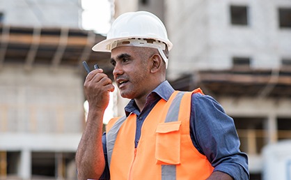 construction worker using radio