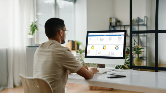 male employer processing payroll