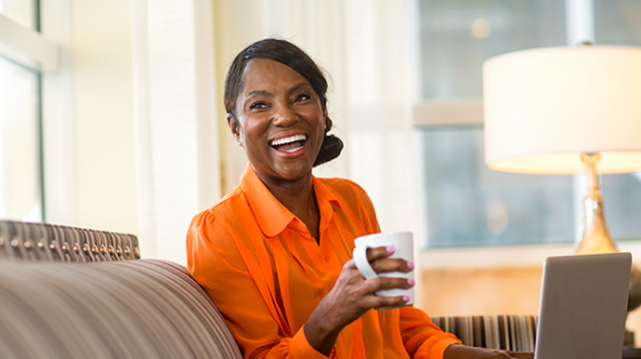 woman-with-coffee-cup-ideal-hr-team