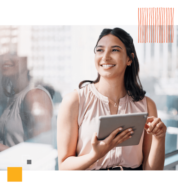 smiling woman holding tablet