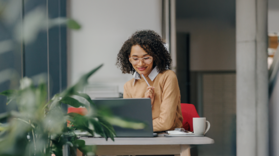 a female employee looking at her company's employee benefits