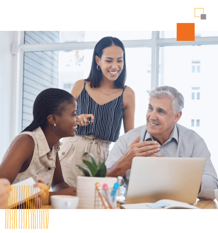 three workers pleasantly talking in office