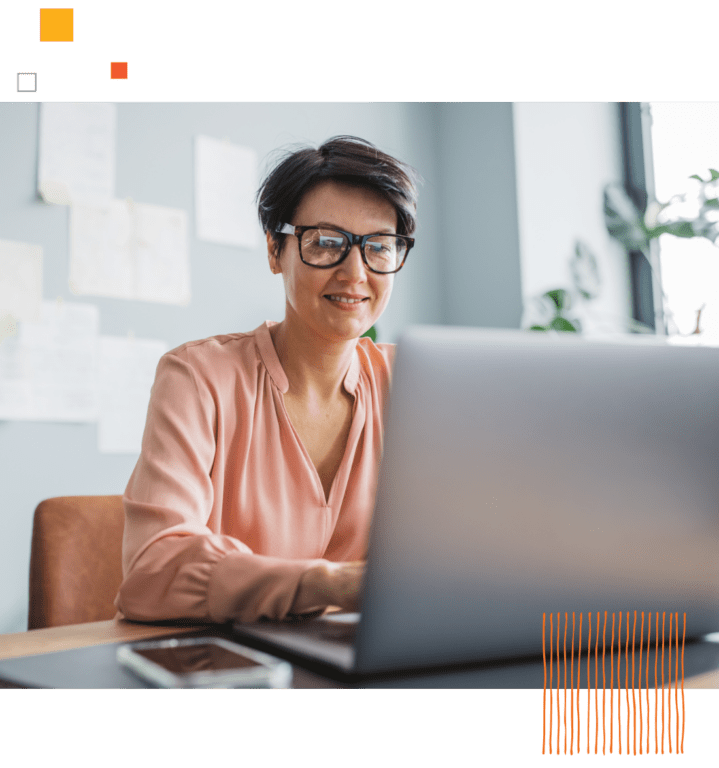 woman at the office sitting in front of laptop 