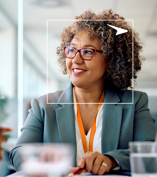 Smiling woman sitting at desk