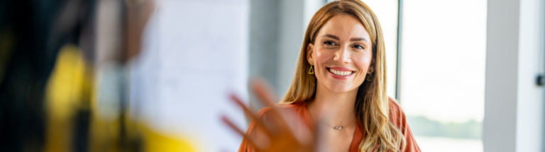 an employer delivering a performance appraisal phrase to an employee
