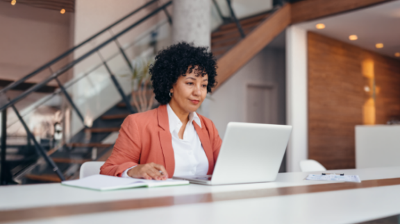 female business owner filling out 941 forms