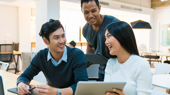 two employees discussing leadership development