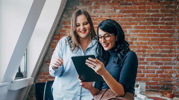 two employees creating a performance improvement plan