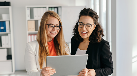 HR leaders celebrating their employee retention metrics