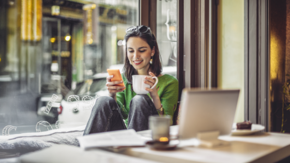 employer demonstrating time theft by drinking coffee and looking at phone