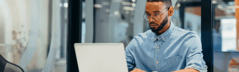 man researching on computer