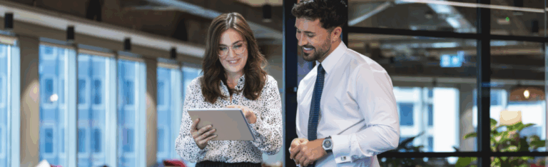 HR leaders creating a payroll report with Paycor's software
