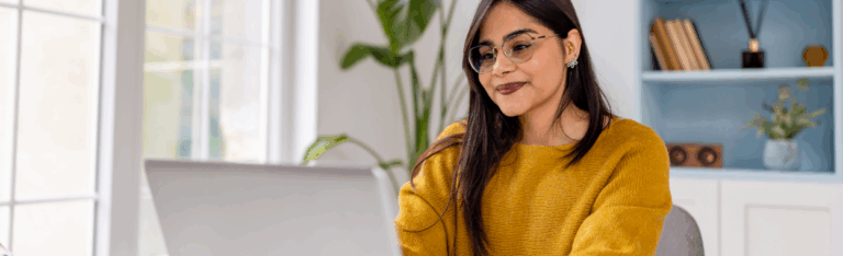 employee completing onboarding and orientation on a computer