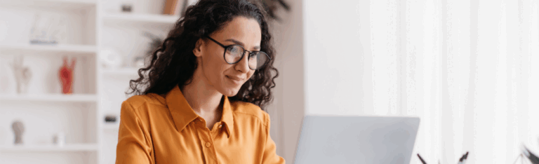 employee building a payroll report on a computer