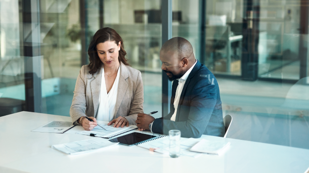 HR professionals creating a talent management strategy