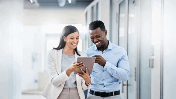 two employees with a sense of belonging in the workplace