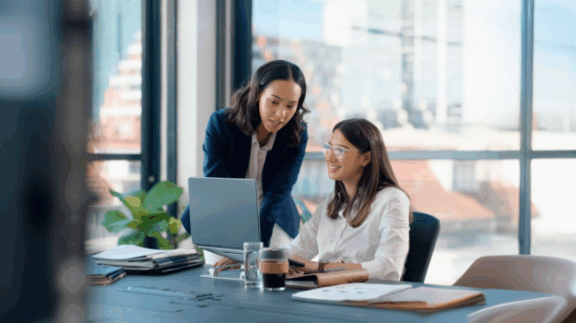 employees discussing areas of professional development and growth