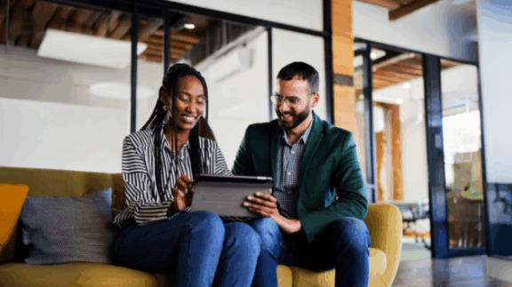 an employer helping an employee understand open enrollment