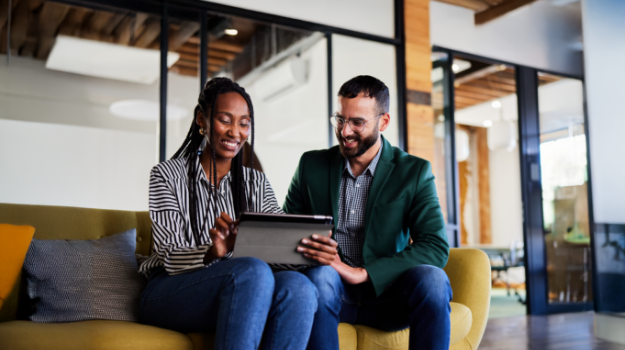 an employer helping an employee understand open enrollment