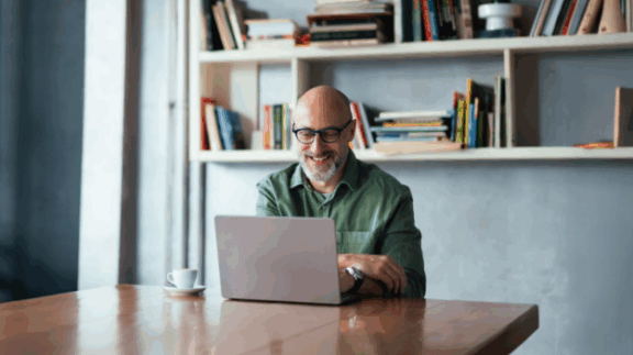 HR professional smiling after fixing payroll mistakes