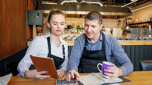 an exempt and non-exempt employee working together