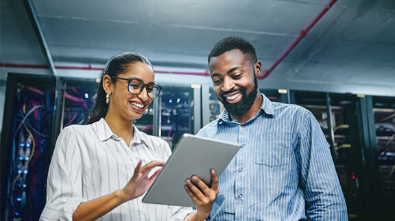 two HR professionals scheduling full-time hours
