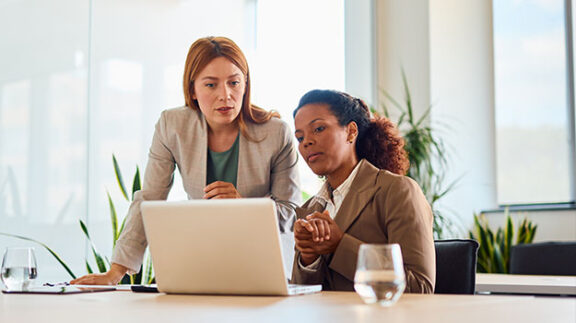 HR Professionals comparing W2 vs W4 tax forms