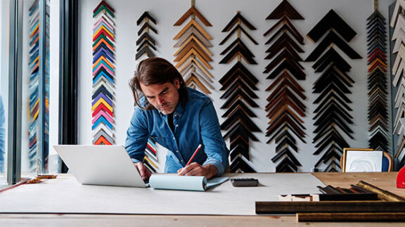 business owner making a list of tax write offs for llc