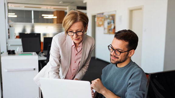 HR leaders filing an employee work contract template